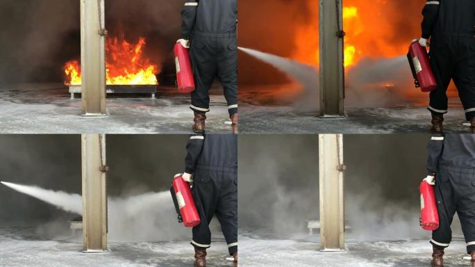 消防员用二氧化碳灭火器或干燥化学品灭火。燃烧房屋消防演习。高质量4k镜头。