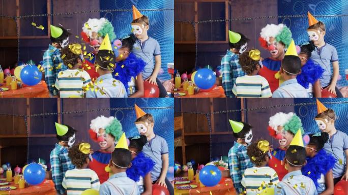五彩纸屑掉落在小丑和孩子们在聚会上玩耍的动画
