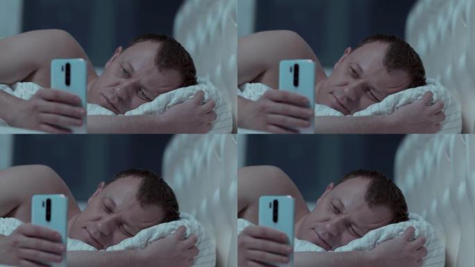 夜人躺在床上，手里拿着手机，看新闻，失眠