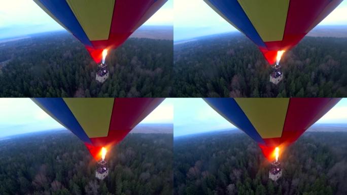 热气球在森林上空飞行