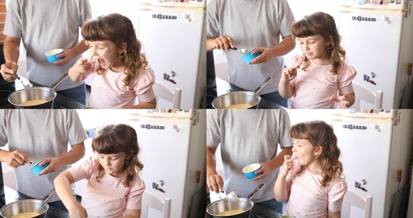小女孩品尝罐中的炼乳剩菜，而她的父亲则将黄油倒入锅中。