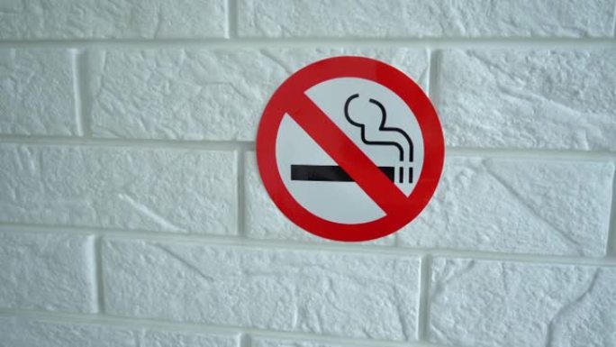 禁止吸烟标志。墙上挂着禁止吸烟的标志。4k素材。