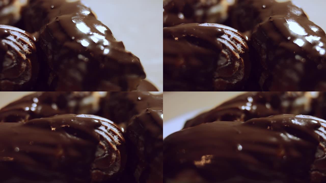 法国甜点-巧克力蛋糕。巧克力泡芙的宏观视图。4k视频。