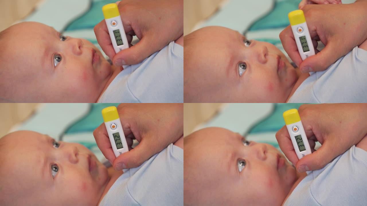 母亲用数字温度计测量婴儿体温，测量一个三个月大男婴的腋下温度，温度计显示温度上升。