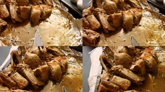 我把鸭子煮成几块。鸭子发出蒸汽，看起来很开胃