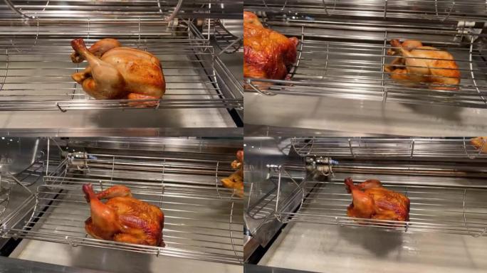 旋转机器是烤整只鸡。连续烤鸡