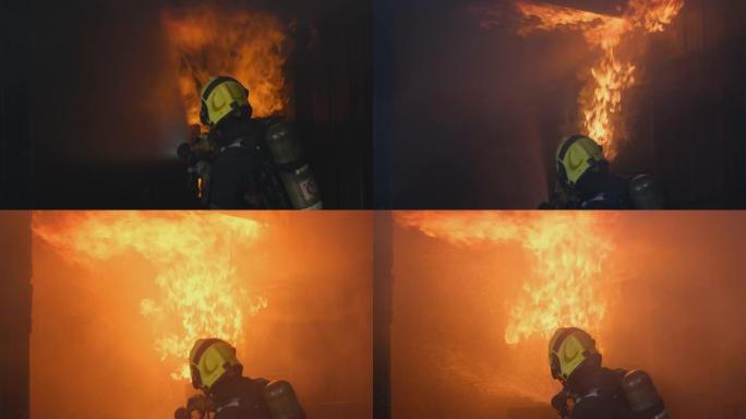 消防员试图扑灭房屋厨房墙壁和天花板上的火烧，但水的支撑较少存在问题