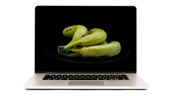 4k视频香蕉笔记本电脑深银模型，屏幕隔离在白色背景