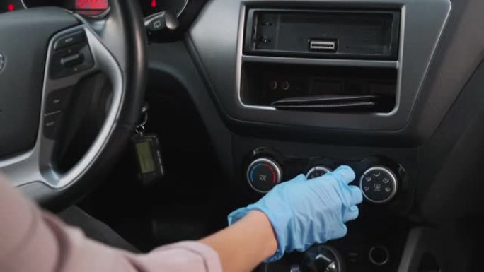 忧郁症女司机驾驶汽车时戴橡胶手套