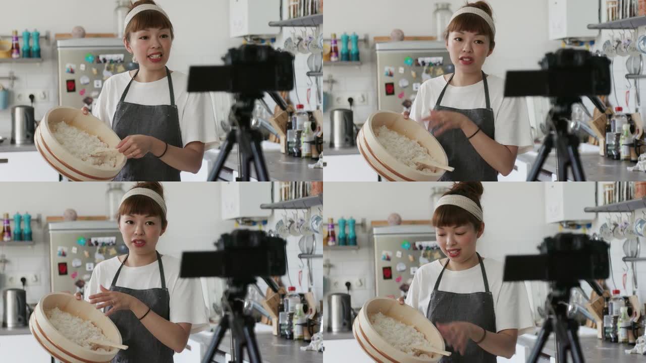 日本女厨师向她的虚拟活动班展示如何在hangiri制作寿司饭