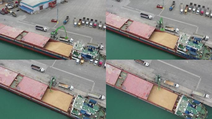 在国际港口卸载的货船的鸟瞰图。