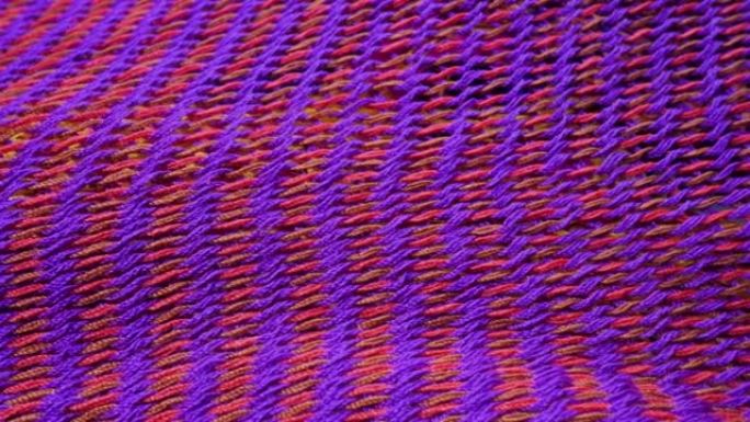 红色和紫色针织面料表面抽象背景