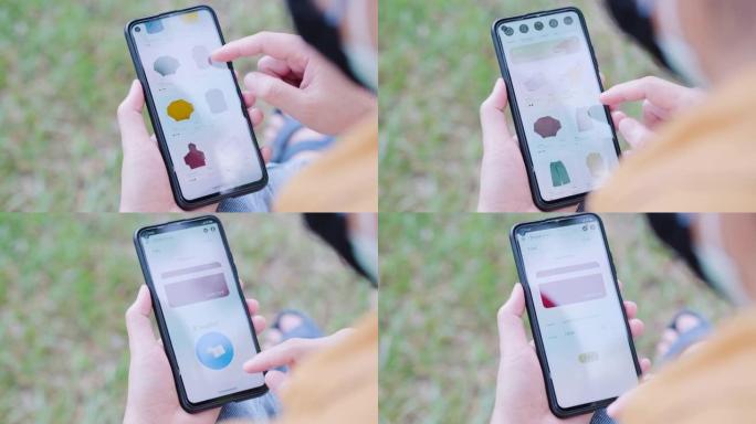 特写女人在发布公园使用手机在线购物。非接触式支付