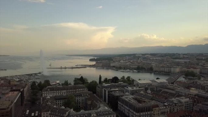 瑞士日落时间日内瓦城市景观湖边喷泉湾空中全景4k