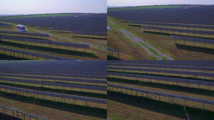 黎明时的太阳能农场。工业产量中的太阳能生产。光伏元件、逆变器。向电网供电。