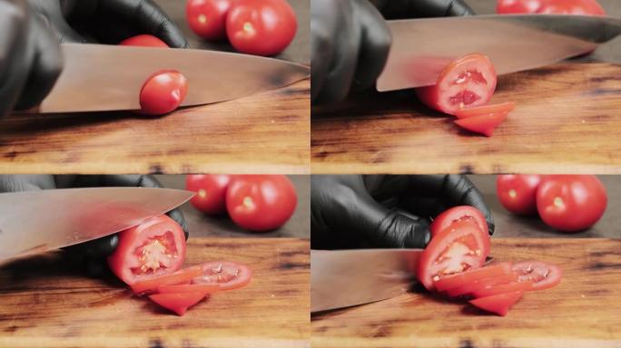 人用菜刀将新鲜的红番茄切成木砧板。健康饮食。想法烹饪沙拉或蔬菜的不同菜肴