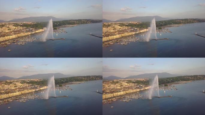 瑞士日落之光日内瓦城市景观湖著名喷泉湾空中全景4k