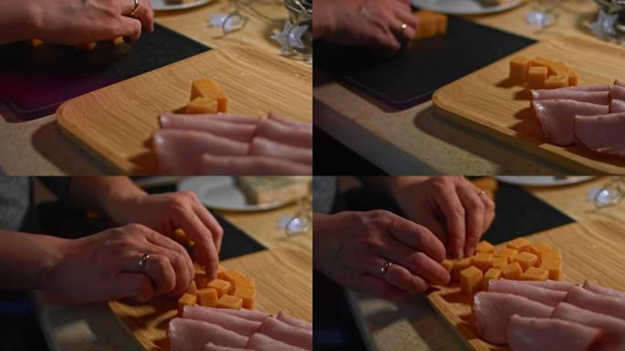 切达干酪块被安排在木托盘上，作为美味诱人的开胃菜。4k视频