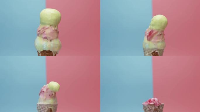 冰淇淋草莓青柠彩虹3种口味在蓝色粉红色背景上的锥体。