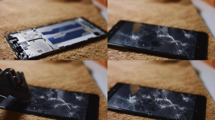 智能手机屏幕的宏观视图。有人用坚硬的物体疯狂地打破屏幕。智能手机坏了。4k视频