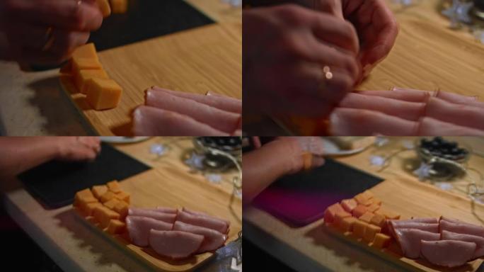 切达干酪块被安排在木托盘上，作为美味诱人的开胃菜。4k视频。延时