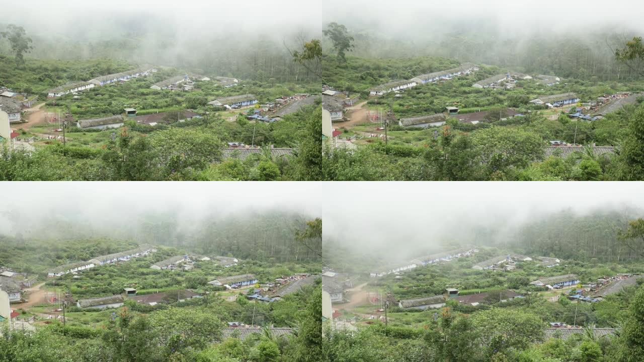 喀拉拉邦Munnar的茶园和工党房屋上多云/雾