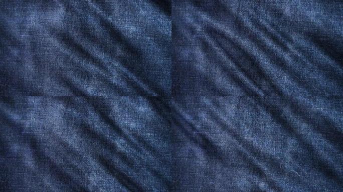 蓝色牛仔布的宏观照片，吉恩。现代服装纺织品，详细的时尚材料。