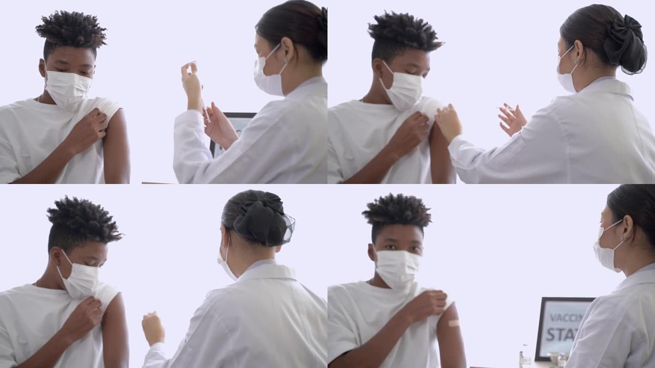 女医生使用注射器从瓶子里取疫苗注射给非裔美国男子以获得免疫力，以保护病毒。戴着防护面具的少年。