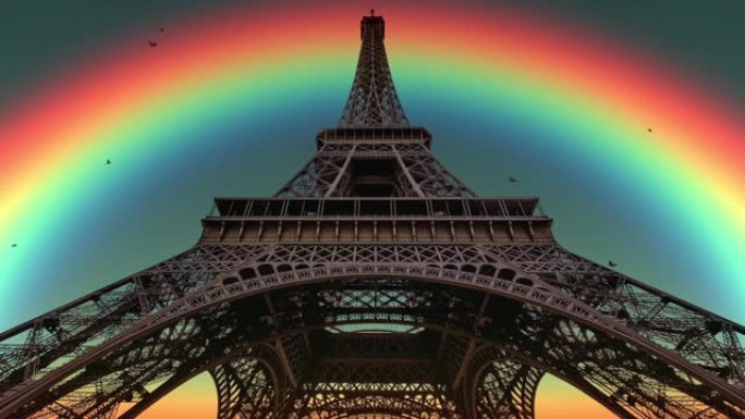 一条巨大的彩虹，鸟儿高飞在法国巴黎的埃菲尔铁塔上