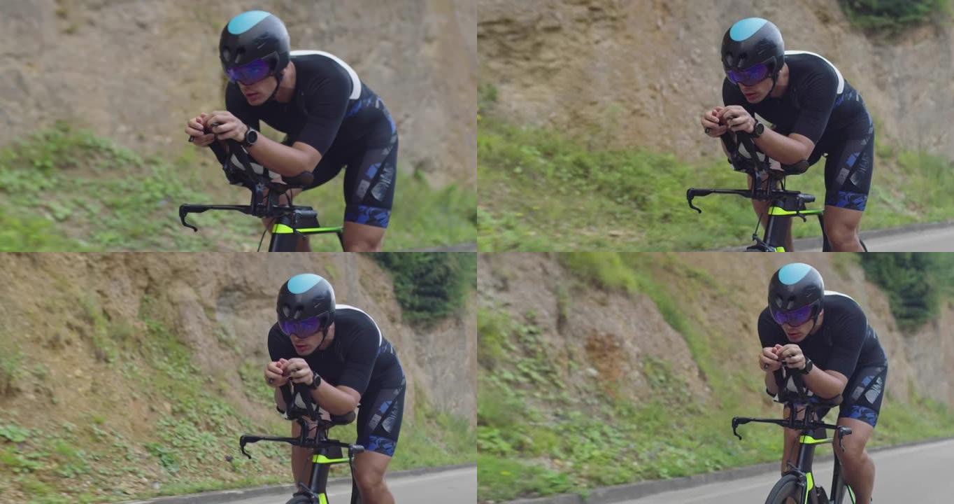 铁人三项运动员运动员骑自行车的特写镜头。
