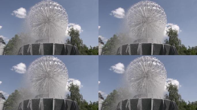 球形喷泉在夏日以慢动作喷水