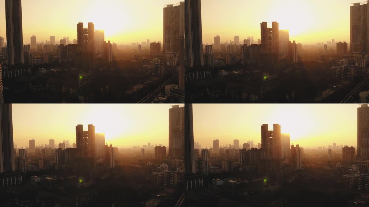孟买市现代城市高层摩天大楼的轮廓鸟瞰图，美丽的黄色傍晚拍摄。4k,
