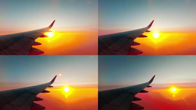 立陶宛-格鲁吉亚: 7月1日，2021: 飞行窗口中的Wizzair与惊人的日落背景