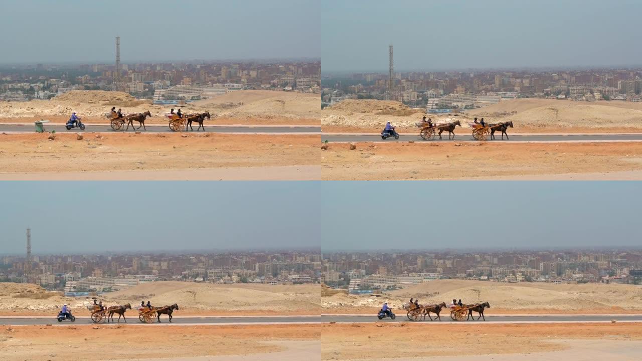 在阿拉伯城市的背景下，马车沿着沙漠中的道路骑行
