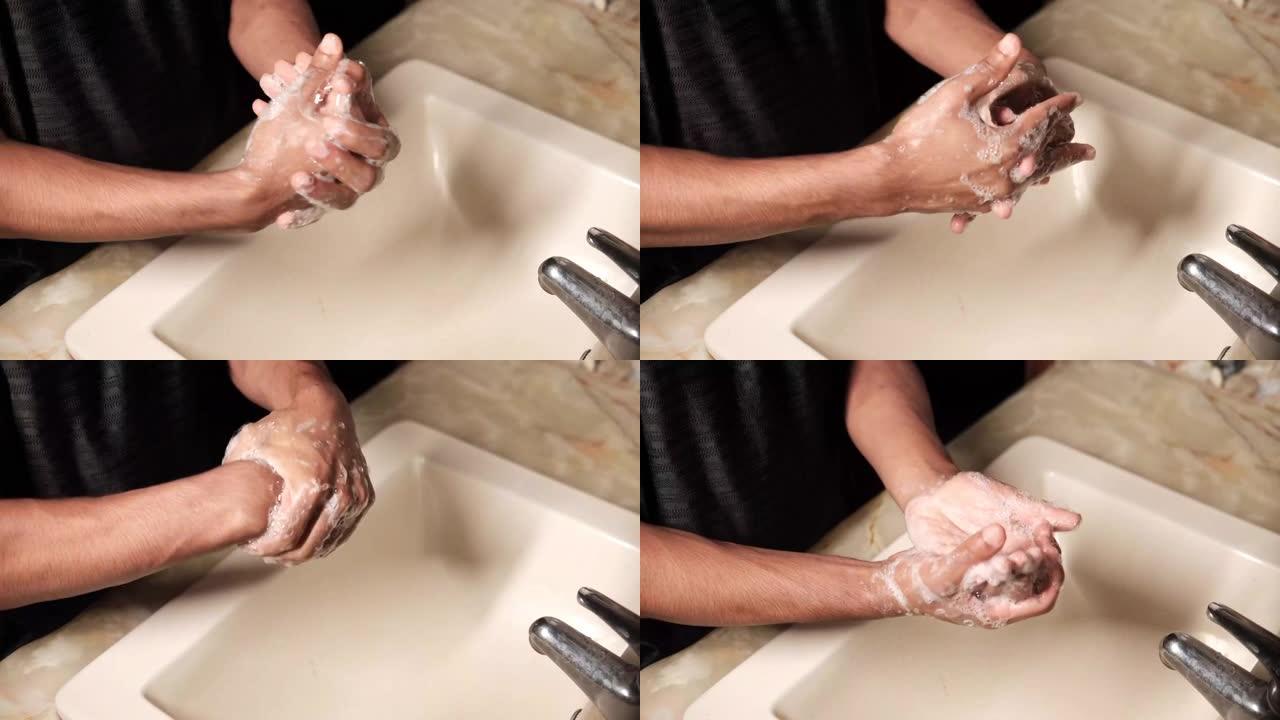 年轻人用肥皂温水洗手