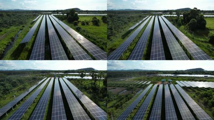 带阳光的太阳能电池板农场 (太阳能电池) 的4k鸟瞰图，无人机飞行飞越太阳能电池板领域泰国可再生绿色