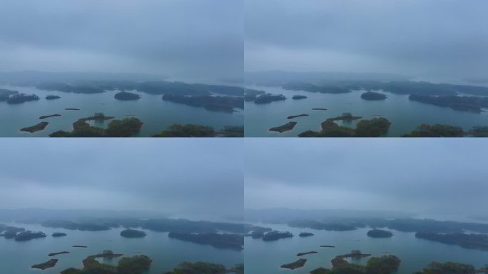 河南省信阳市春季清晨大雾的南湾湖航拍风光