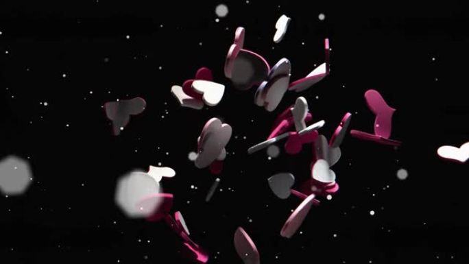 红色和白色的心脏落在黑色背景上的动画，带有白色光点