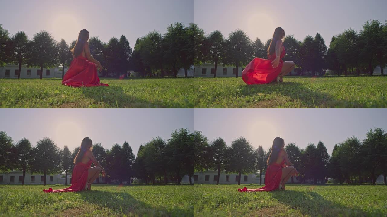 一个穿着红色长裙的女孩坐在草坪上。红色氦8K