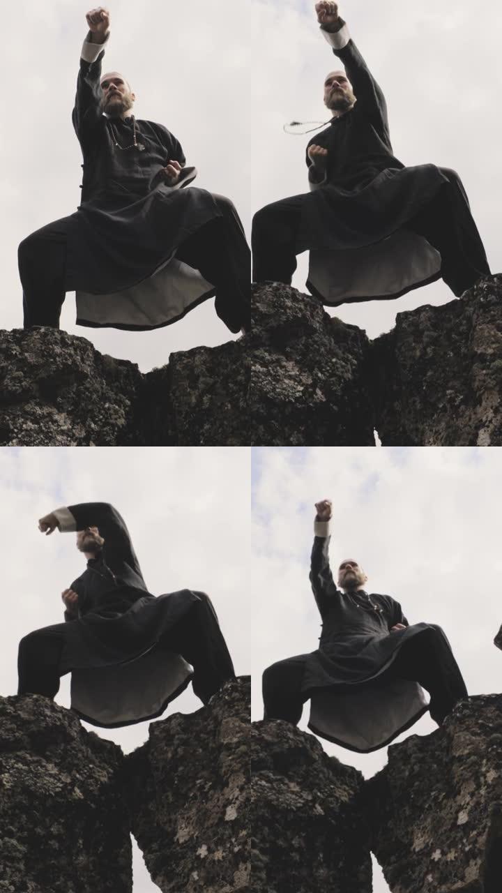 功夫大师在冰岛的岩石上表演空手道动作