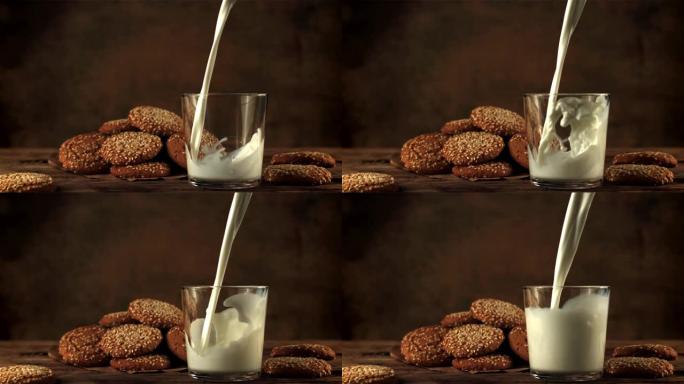 超慢动作在玻璃杯里倒鲜牛奶。以1000 fps的高速相机拍摄。