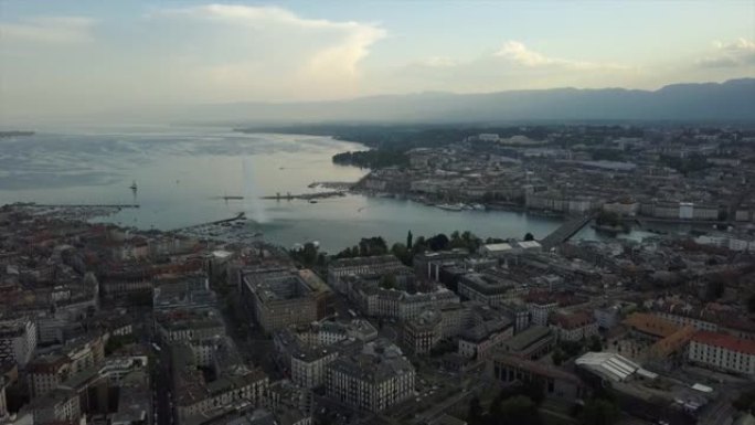 瑞士日落时间日内瓦城市景观湖滨湾空中全景4k