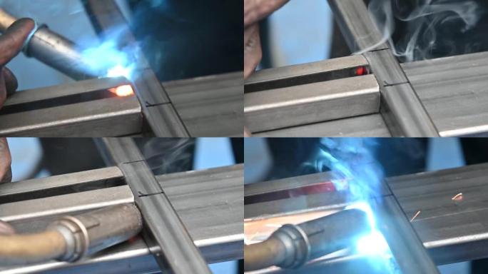 在金属车间焊接两片钢的特写照片，当钢被焊接时，它被视为强大的白光发出，火花发出