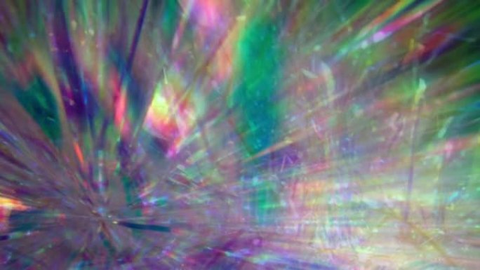 水晶棱镜折射出鲜艳的彩虹色的光线。钻石霓虹金属全息背景