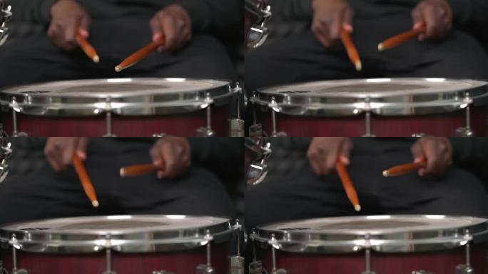 非洲人的手打鼓。鼓手用鼓槌独奏。打击乐器。