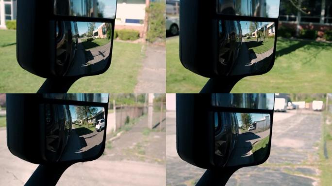 特写。窗户和镜子的视图。卡车司机在夏天在公路上驾驶卡车。慢动作