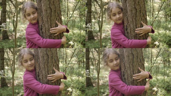 心满意足的小女孩拥抱着大树，表达着自然保护的幸福。和谐平静放松。拯救地球绿色星球。儿童女孩在公园拥抱