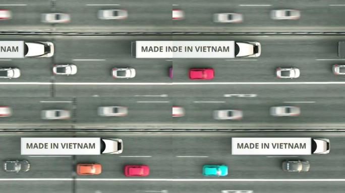 沿高速公路行驶的带有越南制造文字的半挂卡车的俯视图。越南商业相关可循环3D动画