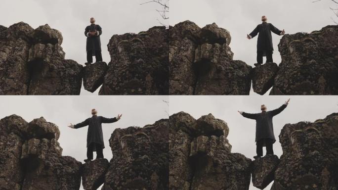 功夫大师在冰岛的岩石上摆姿势