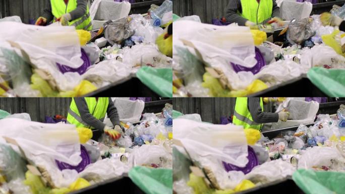 垃圾容器。一堆各种垃圾，塑料，玻璃纸。戴着手套的人正在用手分类垃圾。特写